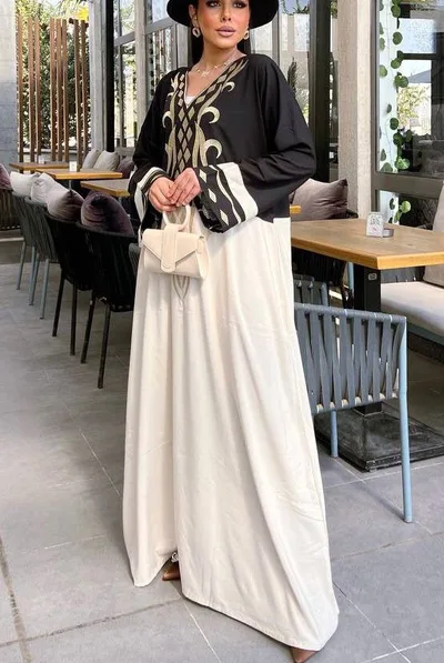 فستان نسائي باللونين الأسود و البيج